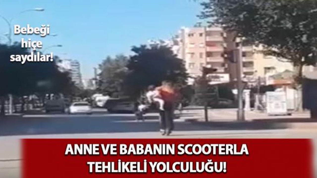Anne ve babanın tehlikeli scooter yolculuğu! Bebeği hiçe saydılar...