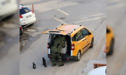 Taksiye binip karton kutusunu almadan kaçan şüpheli, polisi alarma geçirdi