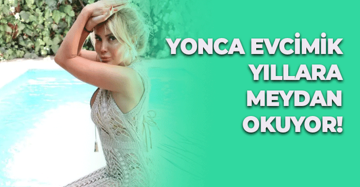 Yonca Evcimik Beyaz  Mini Elbisesiyle Sere Serpe Uzandı